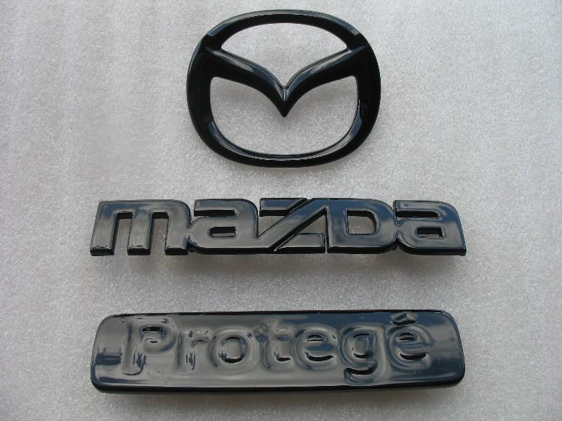 99-02 mazda protege rear trunk painted black blacked out emblem badge decal set