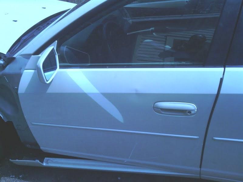 03 04 05 cadillac cts  door cream complete with keythru 01/13/05 1007048