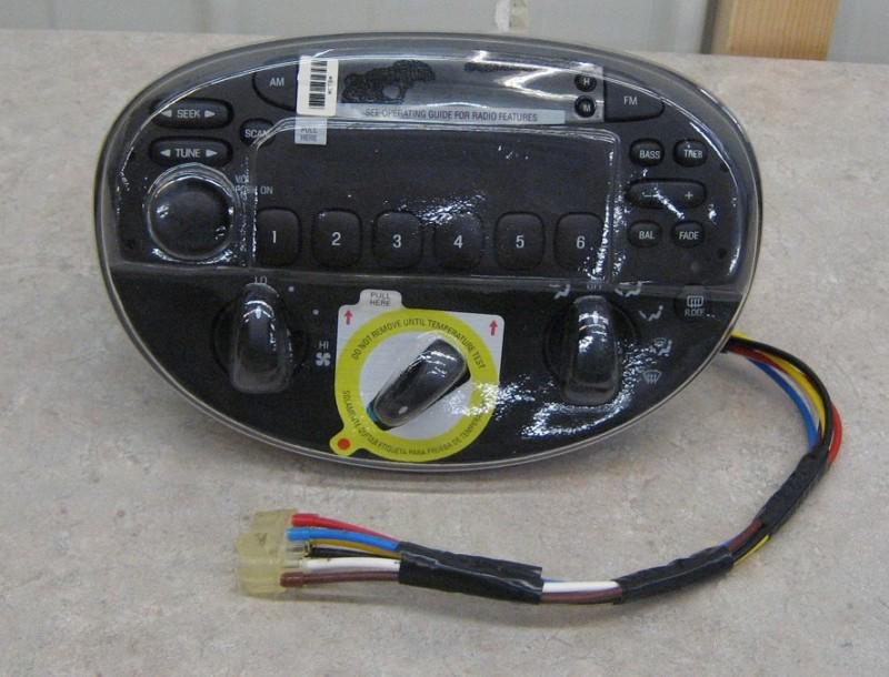 Brand new oem ford escort am/fm radio with temp controls - fast shipping