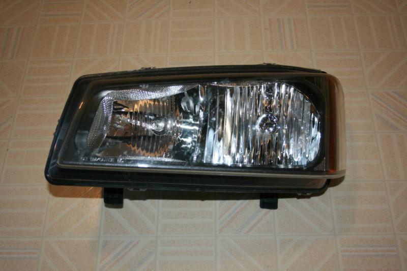 2005 chevy truck headlight left side.