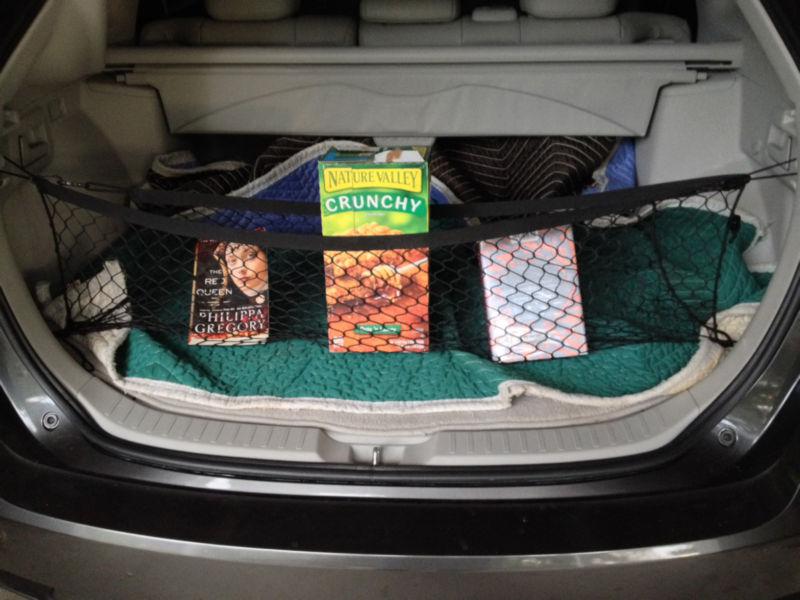 Universal cargo net fits most cars and suvs   venza murano etc.