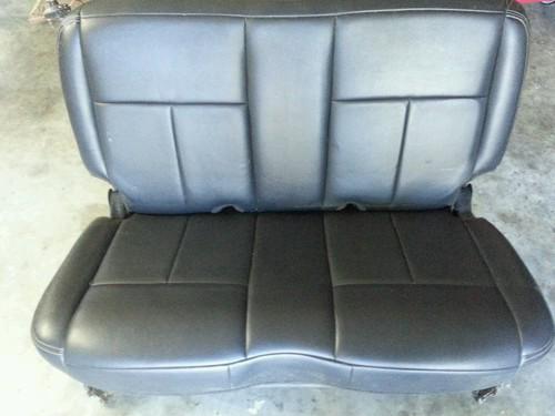 Jeep wrangler folding rear seat -includes brackets - hardware.  never installed 