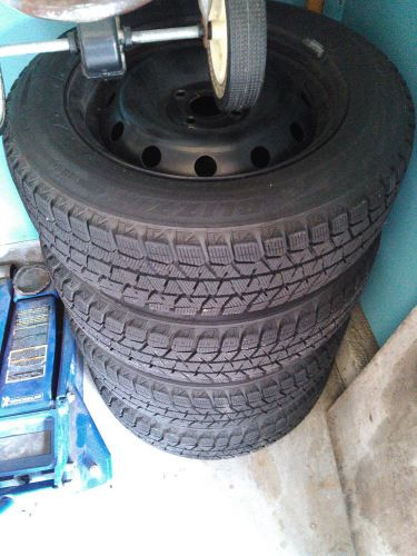 4 185/65r/15 bridgestone blizzak ws80 snow tires on15x6 rims