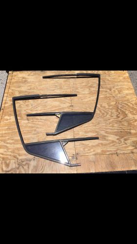 Lot of two porsche 930 turbo window frames with side glass