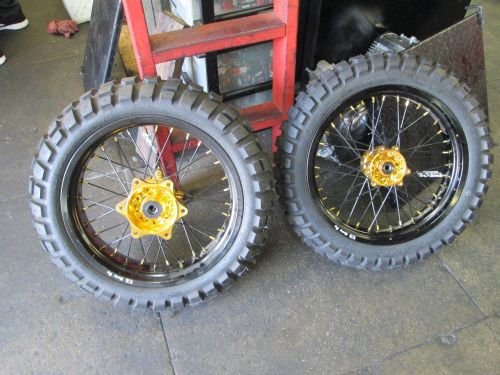 Front and rear wheels and tires of a 1978 suzuki gs750