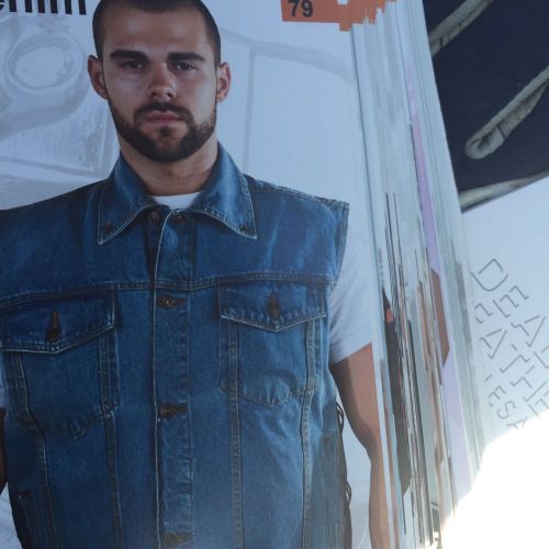 Blue denim  club vest with dual inside gun pockets.