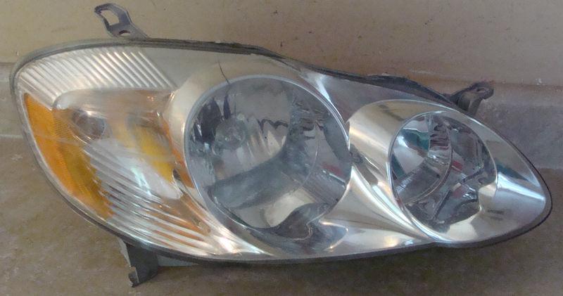  03 04  toyota corolla passenger  side headlight rh factory oem 