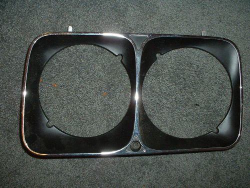 Fiat 124 sedan right headlight bezel. nos fiat part