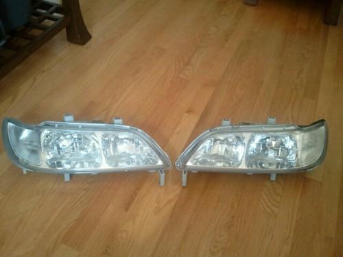 (2) acura oem headlights (driver & passenger) for 1997, 1998 & 1999 acura cl