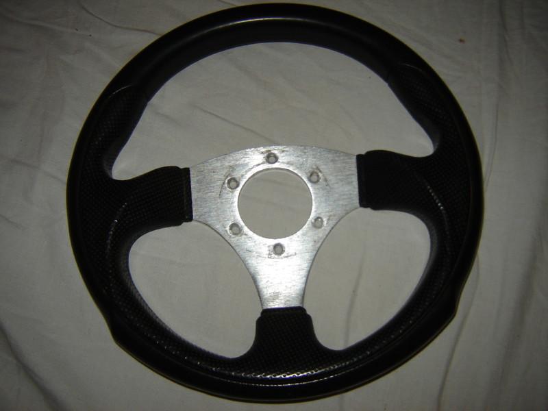 300 mm steering wheel with momo fiting holes..