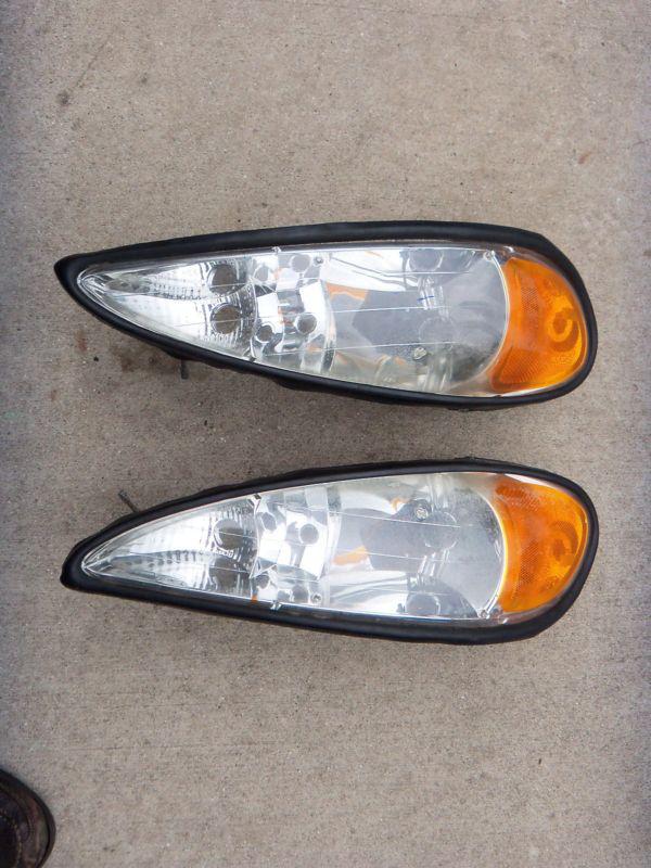 '99-2005 pontiac grand am lh / rh headlight lamp oem gm 1652455 16524551