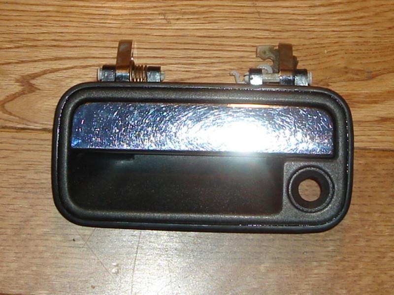 88-02 mazda 626 door handle assembly  drivers side, left front main door