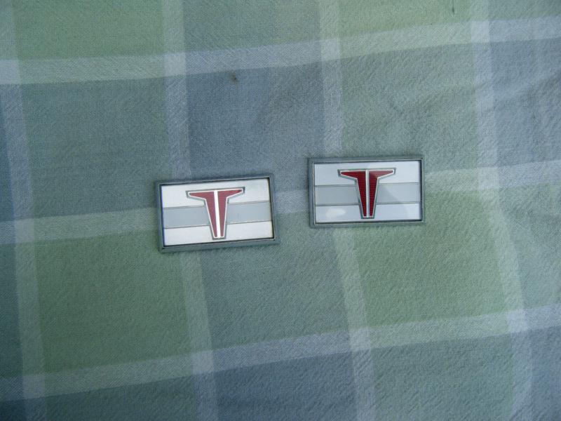 1964 f85 cutlass door panel emblems in nice shape