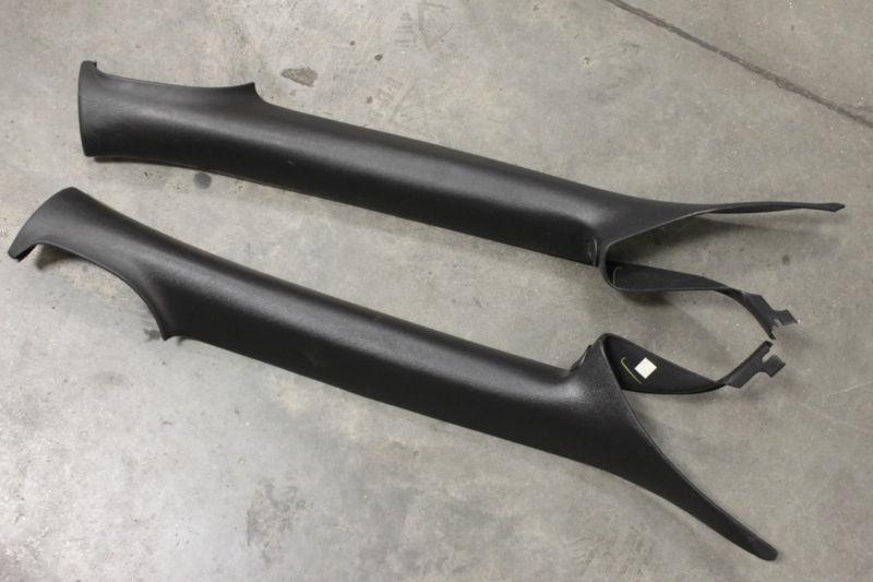 00-02 camaro/firebird ebony black a-pillar trim panels pair used