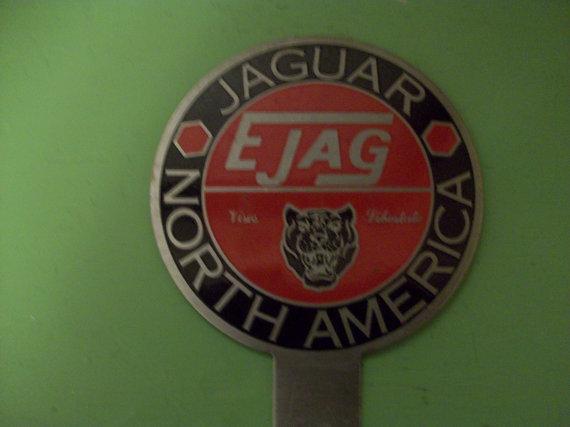 Vintage jaguar enameled car badge