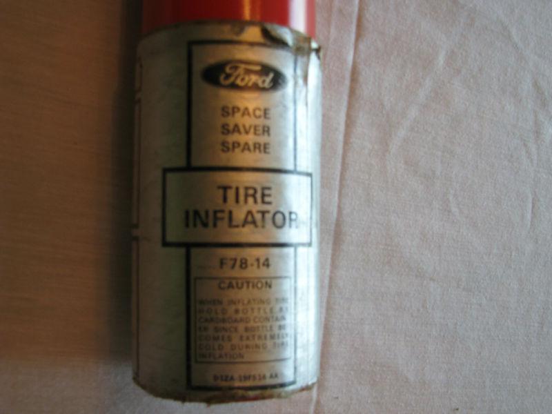 Space saver tire inflator canister for pantera ( used)