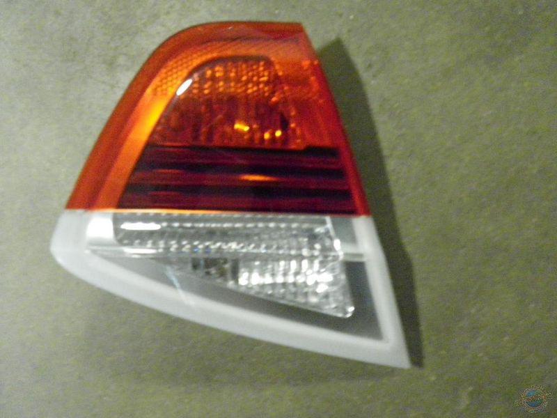 Taillight bmw 325i 1018139 06 assy lft lid