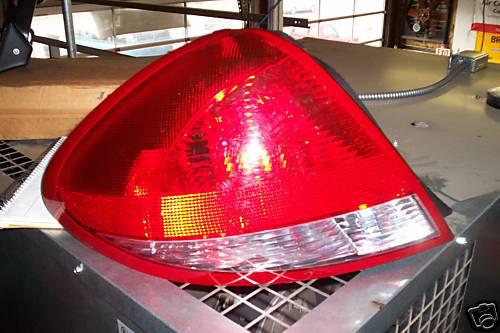 2000-2004 ford taurus lh tail light oem