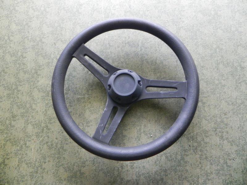 13"  (3)  split spoke steering wheel with a 3/4" tappered shaft