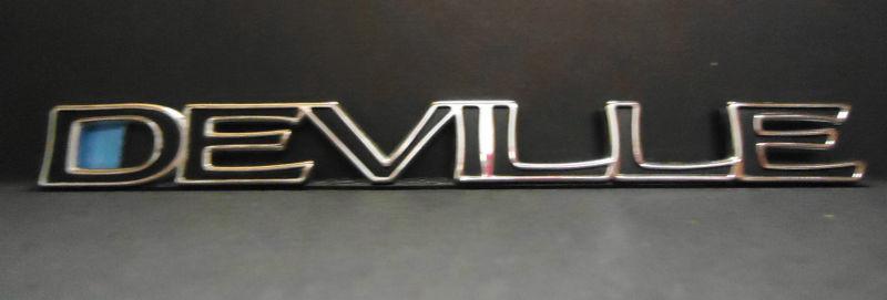 New oem gm cadillac "deville" emblem fits 97-99 rh/lh front door part # 25633919