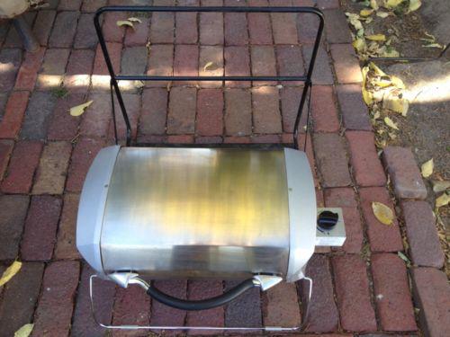 Rv side mount grill/stove w/mounting rack & storage cover. used once.
