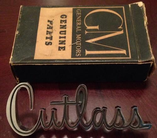 Nos 1963 cutlass chrome  fender ornament emblem 