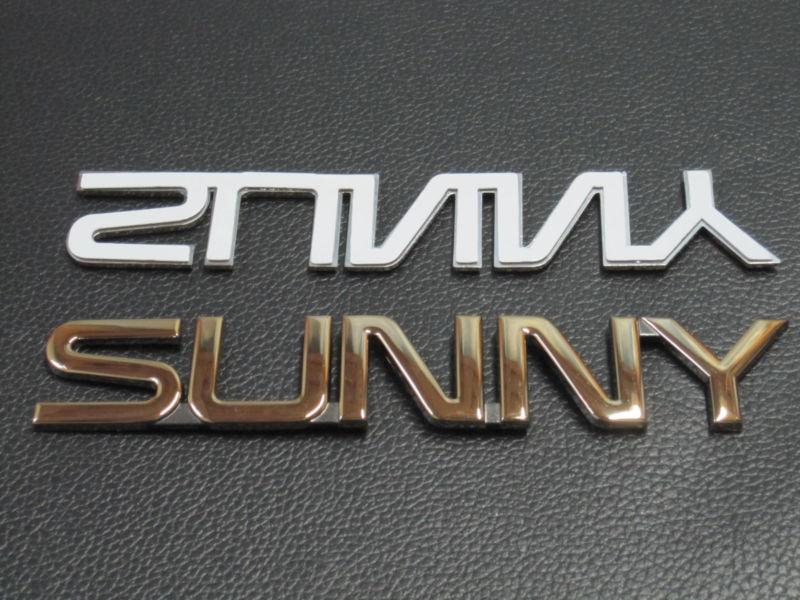 1 sunny gold emblem logo badge for nissan sunny sentra...............a