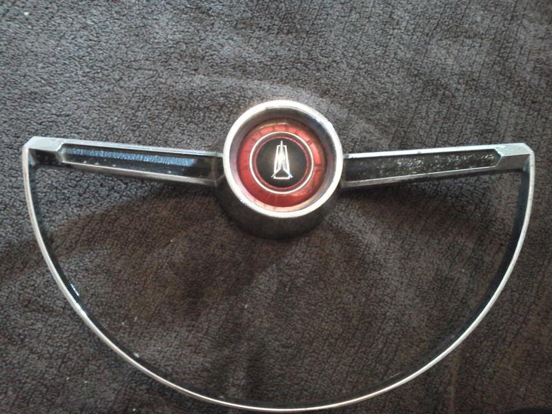 Plymouth horn steering wheel peice