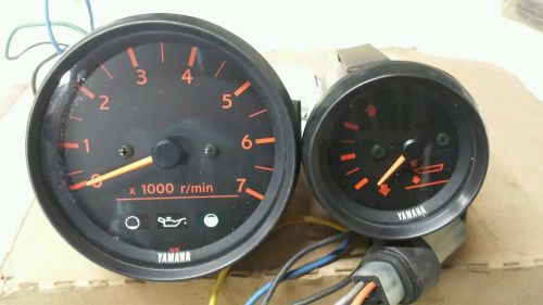 Yamaha marine tachometer/ oil level &amp;power trim and tilt guage.