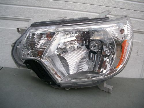 Toyota tacoma 12 13 14 15 headlight  oem  halogen lh