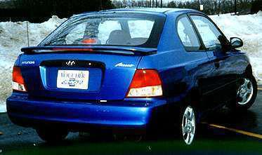 Painted custom style spoiler for a  hyundai accent 2dr  2000-2002