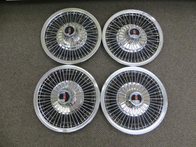 Oldsmobile 14" wire spoke hubcaps set of four