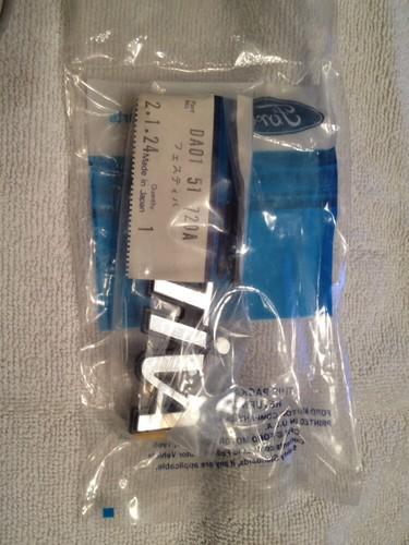 Nos oem ford festiva name plate badge emblem e8bz-6142528-g