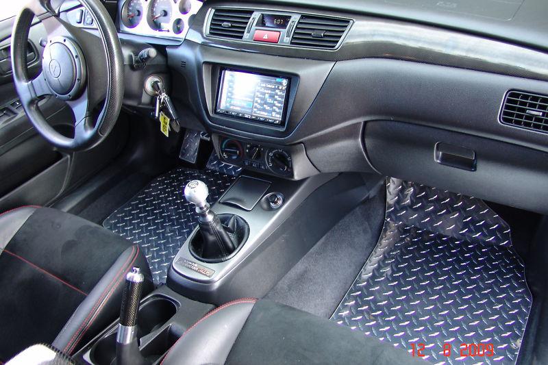 Evo 02-07 aluminum diamond plate floor mats.  front + rear set