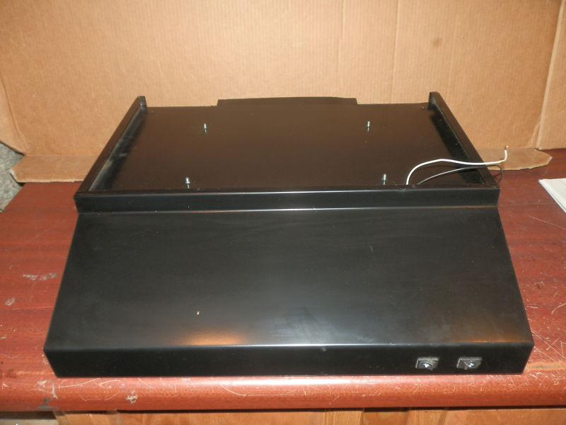 12 volt 20" black ventline range hood ( used )