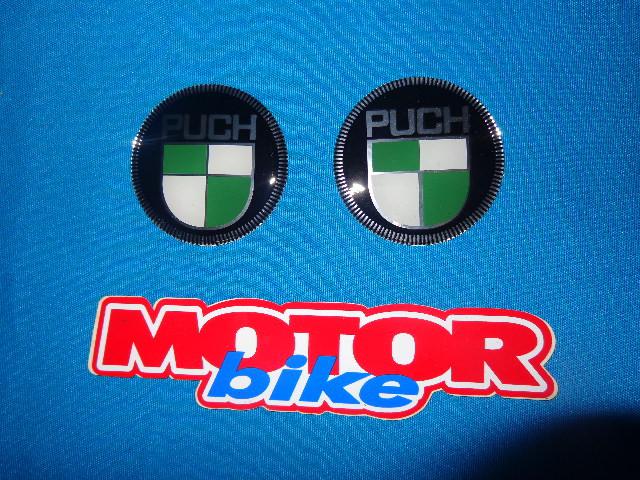 Resin two moto anagrams puch, 55mm diameter.