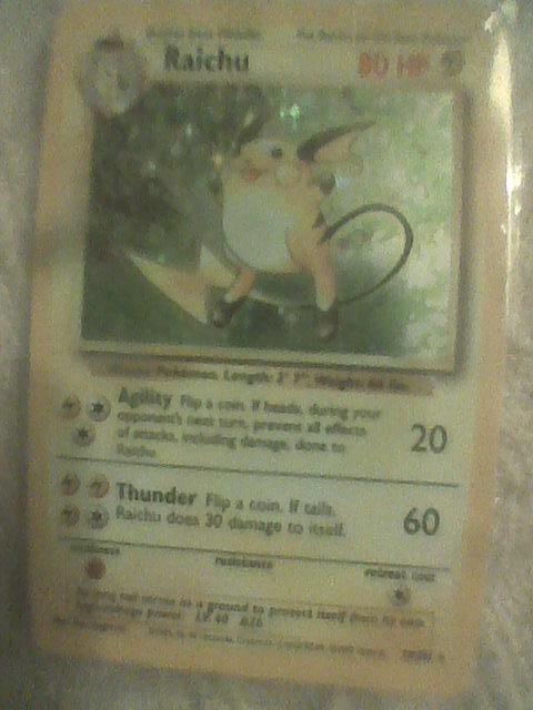 Old pokemon card raichu  holo 1999 14/102 star