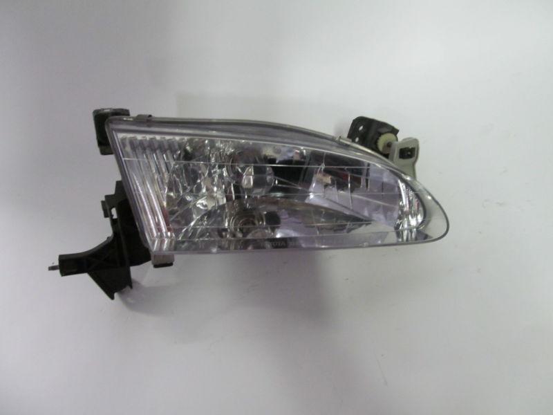 98 99 toyota corolla oem right headlight nice!