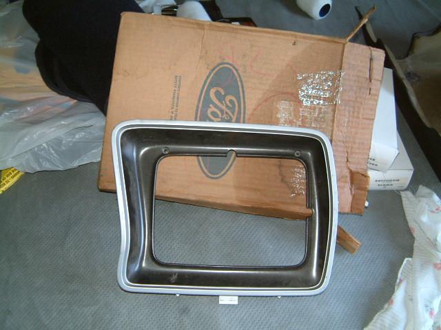 Nos 1978-1979 ford truck drivers side headlight bezel