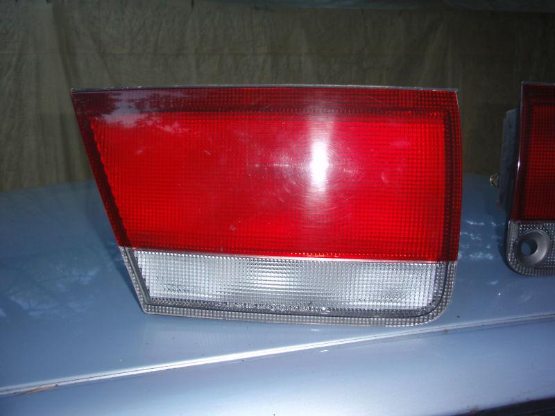 95 mazda 626 inner lh tail light assembly oem