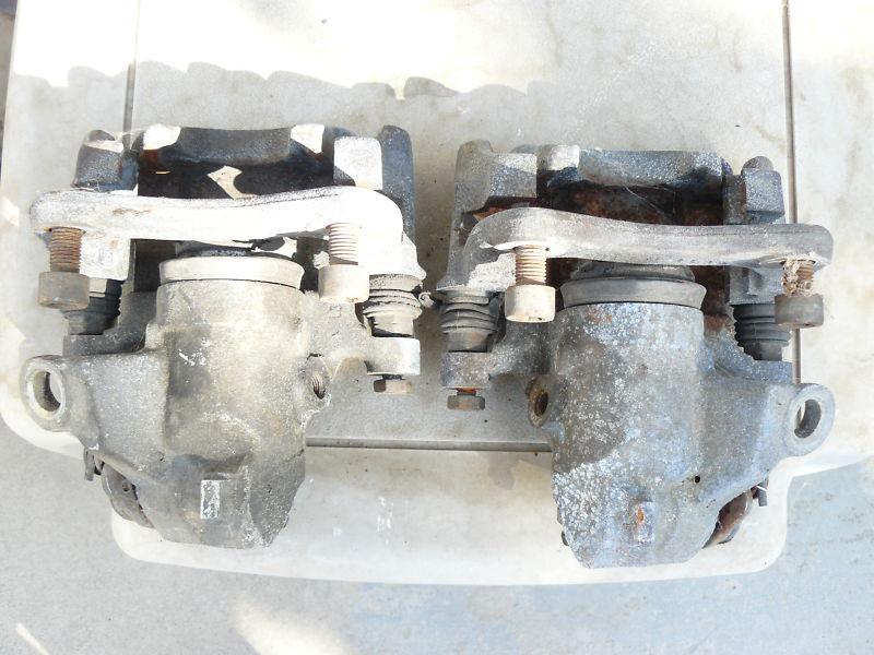 1985 vw golf gti left and right rear brake caliper with mounting brackets