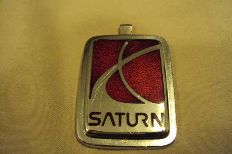 Saturn sl sc sw early 90's metallic steering wheel symbol / emblem