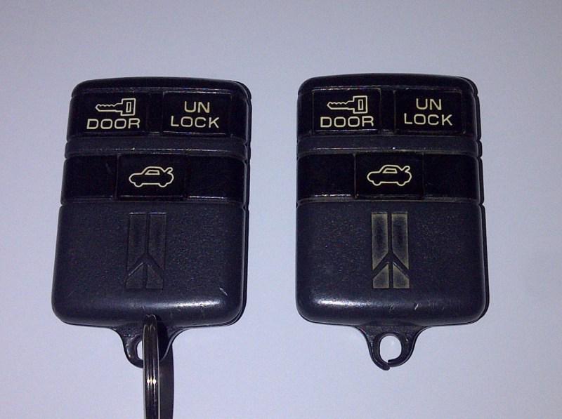 Keyless remote / fob - used - oldsmobile / gm - ab00103t - lot of 2