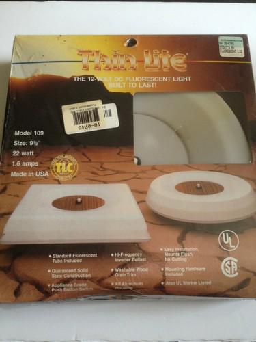 Thin lite round 12v dc fluorescent light  9.5" 22 watt 1.6 amps new nos