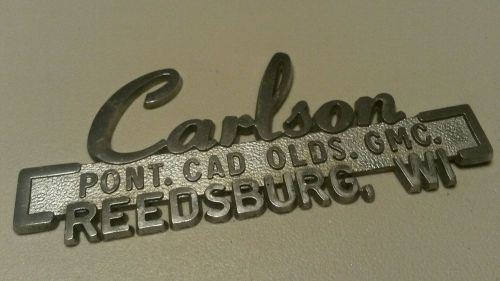Carlson--pont.--cad--olds--gmc--reedsburg wi--metal  dealer emblem car  vintage