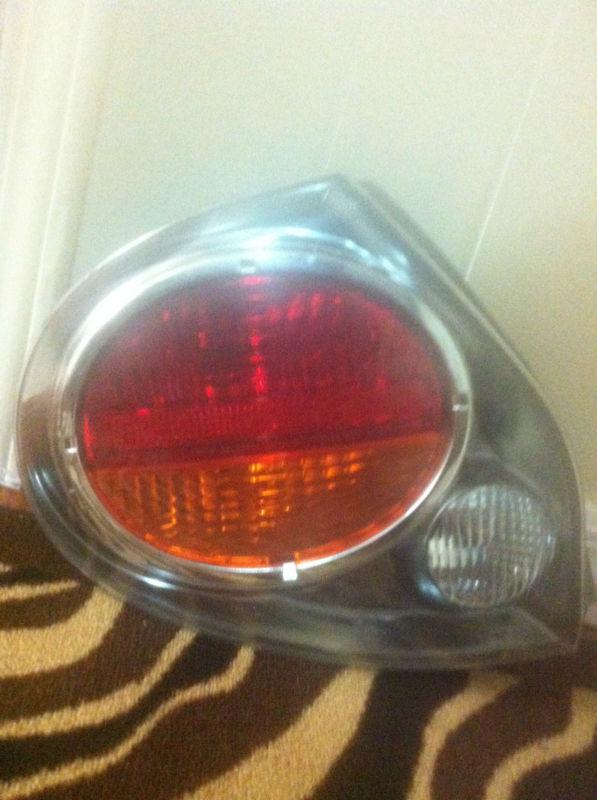 2000 2001 2002 2003 nissan maxima oem left tail light (driver)