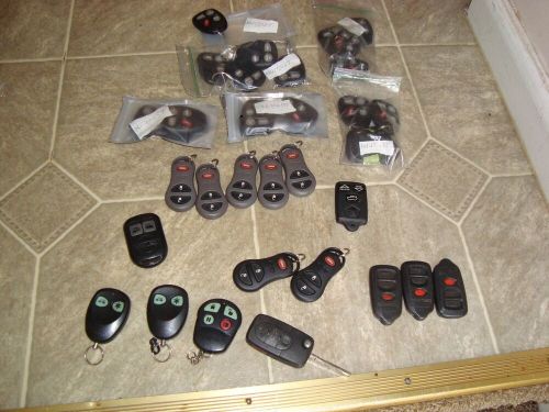 Locksmith huge lot of 33 assorted new &amp; used auto remote fobs