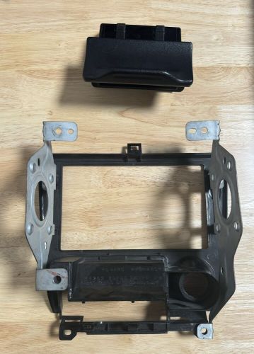 95-98 nissan 240sx s14 oem radio trim bezel with ash tray included.