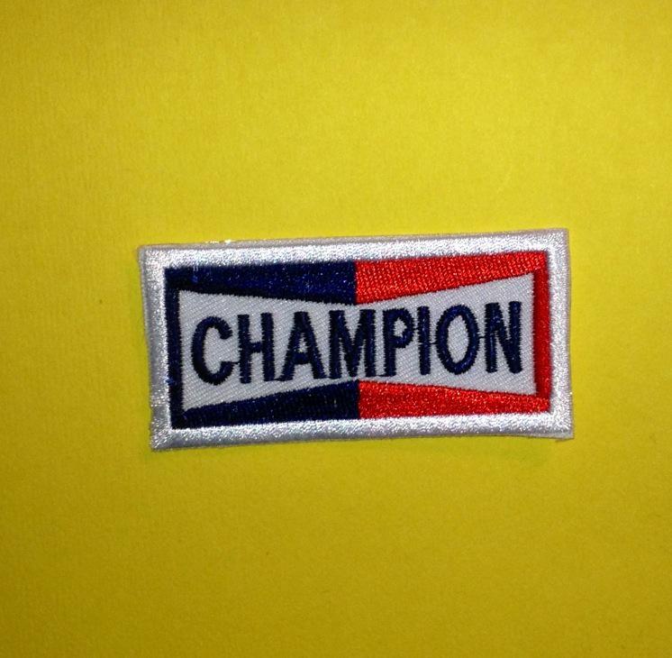 Champion sparkplugs racing nhra nascar f-1 sponsor hat jacket racing gear patch