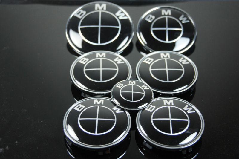 7 pcs bmw black style hood/trunk emblem, wheel caps and wheel steering sticker